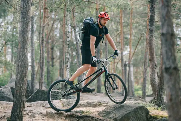 extreme cyclist in protective helmet